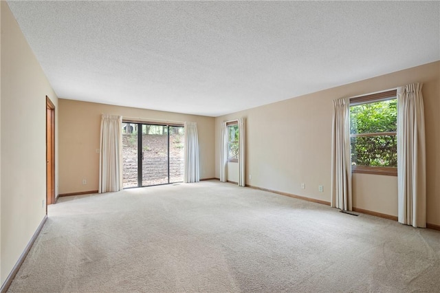 14 Windlass Ct, Salem, SC 29676 - carpeted empty room featuring healthy amount of natural light and a textured ceiling