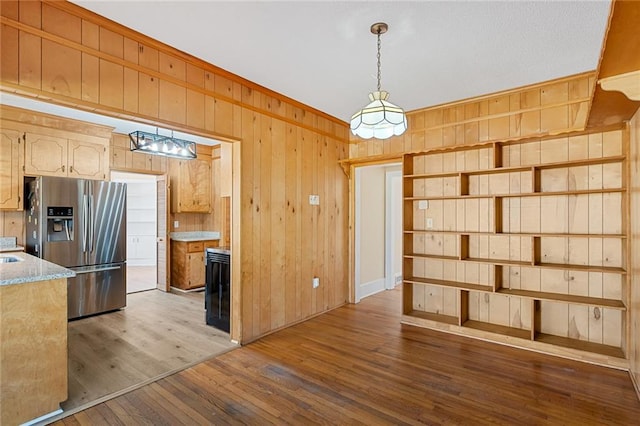 23 Gilmer Dr, Anderson, SC 29621 - unfurnished dining area featuring wood walls, hardwood / wood-style flooring, and crown molding
