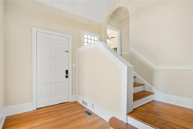 23 Gilmer Dr, Anderson, SC 29621 - foyer featuring arched walkways, light wood-type flooring, stairway, and ceiling fan