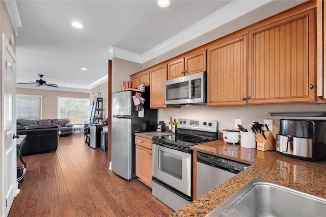 101 W Ln Unit 1000, Clemson, SC 29631 - kitchen featuring appliances with stainless steel finishes, crown molding, ceiling fan, wood finished floors, and open floor plan