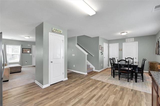131 Colonial Walk, Pickens, SC 29671 - dining space featuring stairway and light wood-style floors