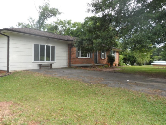 6005 Kaye St, Seneca, SC 29678 - view of front of home with a front yard and brick siding