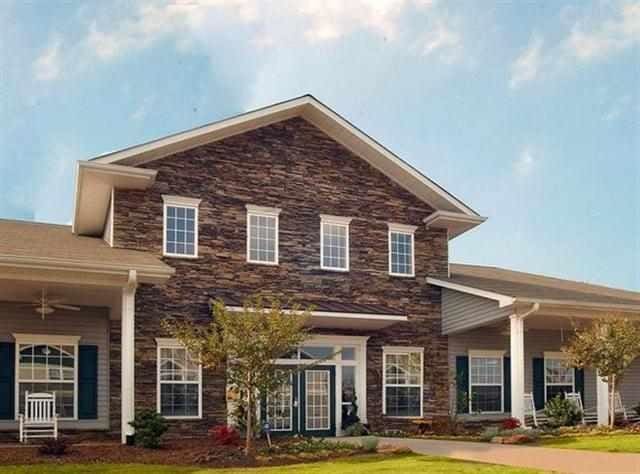 190 University Village Dr Unit G, Central, SC 29630 - view of front facade featuring stone siding, a front yard, and a ceiling fan