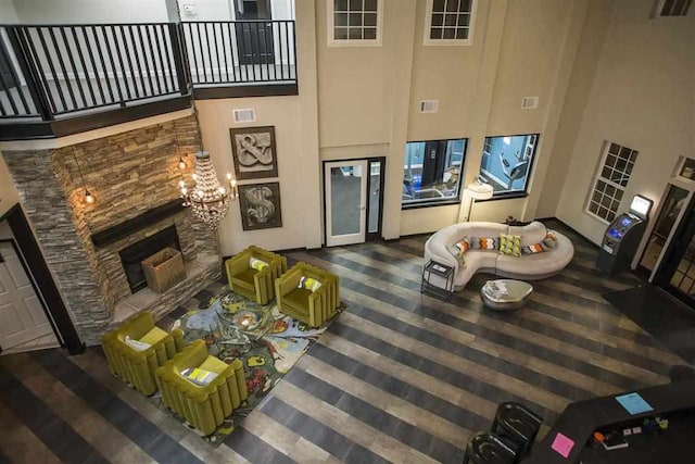 190 University Village Dr Unit G, Central, SC 29630 - living room featuring a towering ceiling and a stone fireplace