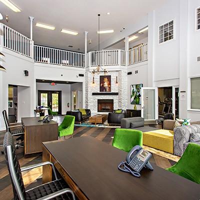190 University Village Dr Unit G, Central, SC 29630 - interior space with a high ceiling, a stone fireplace, and wood finished floors