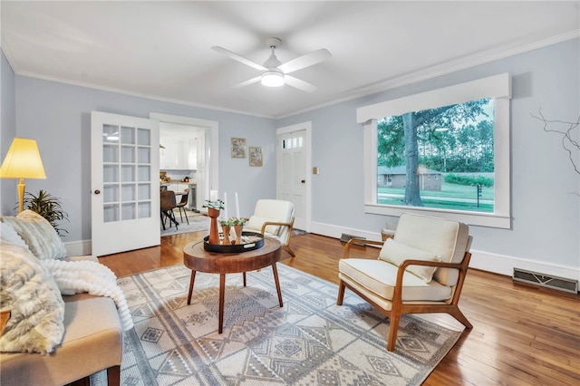 513 Shiloh Rd, Seneca, SC 29678 - living area featuring crown molding, ceiling fan, and wood finished floors