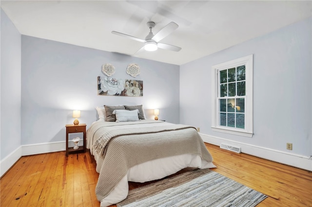 513 Shiloh Rd, Seneca, SC 29678 - bedroom featuring light wood finished floors and ceiling fan
