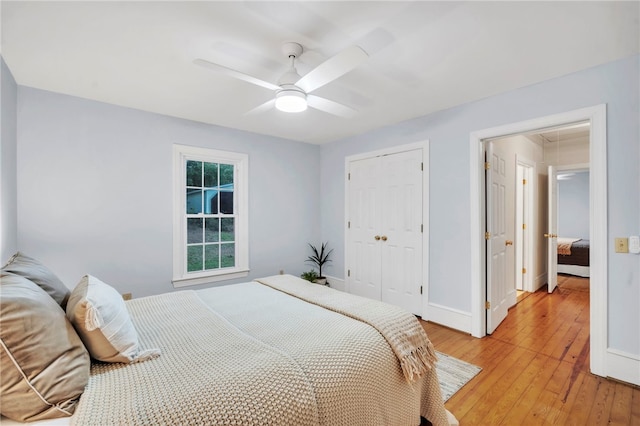 513 Shiloh Rd, Seneca, SC 29678 - bedroom featuring attic access, light wood-style flooring, a closet, and ceiling fan