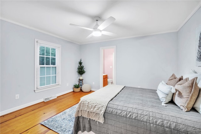 513 Shiloh Rd, Seneca, SC 29678 - bedroom featuring ornamental molding, wood finished floors, ceiling fan, and connected bathroom