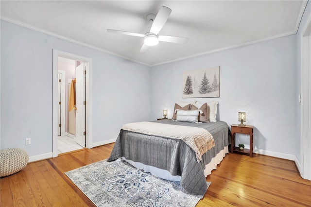 513 Shiloh Rd, Seneca, SC 29678 - bedroom with crown molding, light wood-style floors, ceiling fan, and connected bathroom