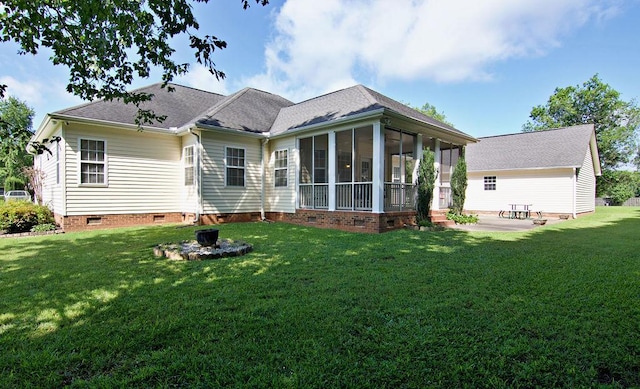 200 Smithfield Dr, Anderson, SC 29621 - rear view of house with crawl space, a sunroom, a yard, a patio, and roof with shingles