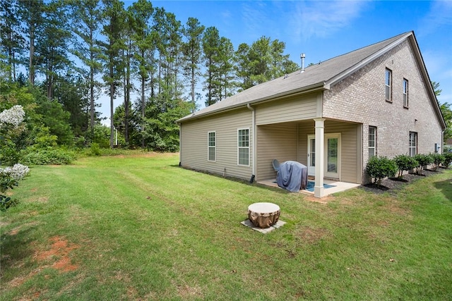 137 Golden Eagle Ln, Anderson, SC 29621 - rear view of property with a patio and a yard