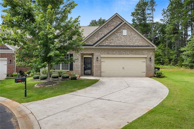 137 Golden Eagle Ln, Anderson, SC 29621 - view of front of house featuring concrete driveway, a front lawn, brick siding, and an attached garage