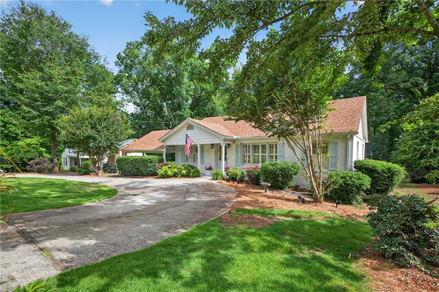 260 Riggs Dr, Clemson, SC 29631 - view of front of house featuring curved driveway, a front yard, and covered porch