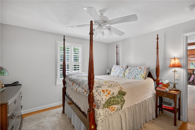 260 Riggs Dr, Clemson, SC 29631 - bedroom featuring a textured ceiling, ceiling fan, and light wood finished floors