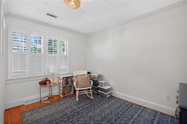 260 Riggs Dr, Clemson, SC 29631 - living area with a textured ceiling, crown molding, and wood finished floors