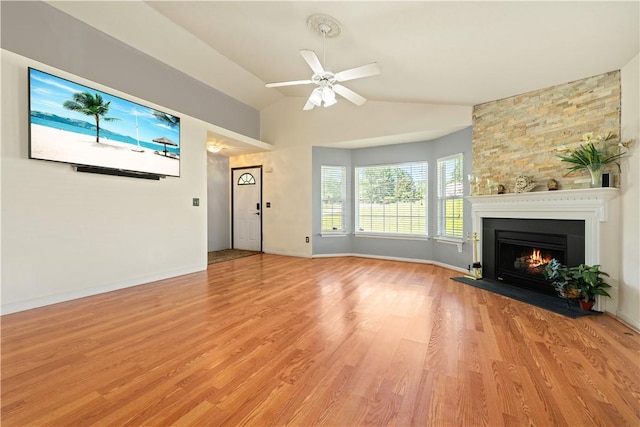 433 Shore Line Dr, Anderson, SC 29626 - unfurnished living room with a large fireplace, ceiling fan, light wood finished floors, and vaulted ceiling