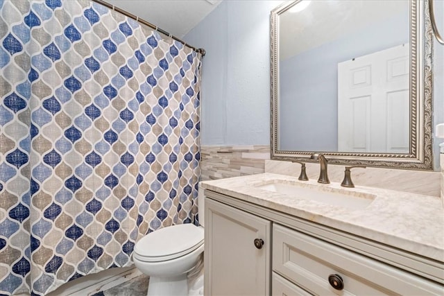 433 Shore Line Dr, Anderson, SC 29626 - bathroom with tile walls, vanity, a wainscoted wall, and a shower with curtain
