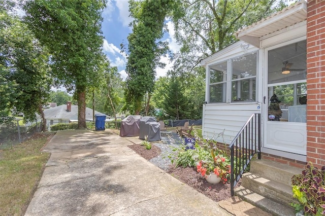 205 James St, Anderson, SC 29625 - view of patio / terrace featuring entry steps, concrete driveway, and a grill