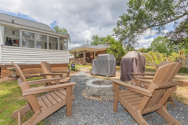 205 James St, Anderson, SC 29625 - view of patio featuring a fire pit and a grill
