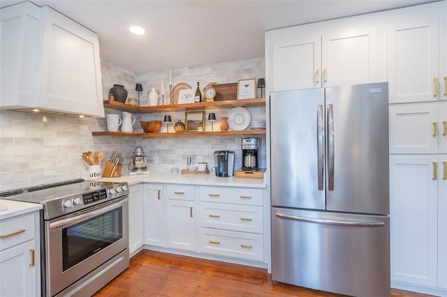 205 James St, Anderson, SC 29625 - kitchen with appliances with stainless steel finishes, light countertops, tasteful backsplash, open shelves, and recessed lighting