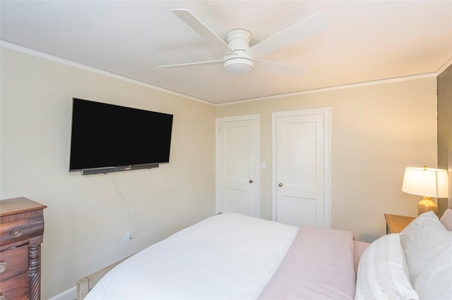 205 James St, Anderson, SC 29625 - bedroom with ornamental molding, ceiling fan, and a closet