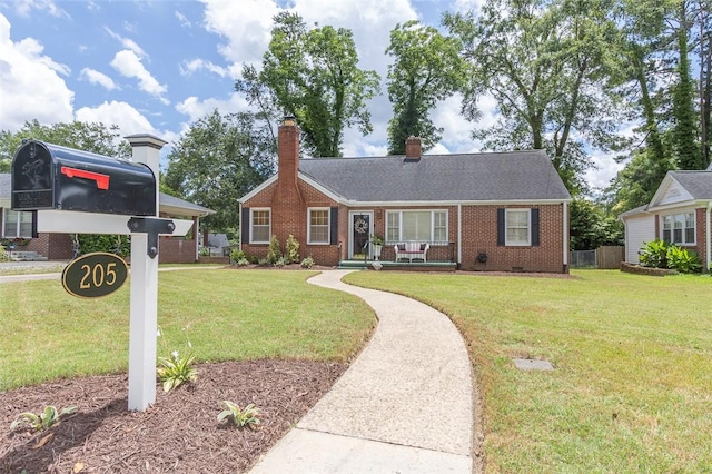 205 James St, Anderson, SC 29625 - ranch-style home with brick siding, a front lawn, a chimney, and crawl space