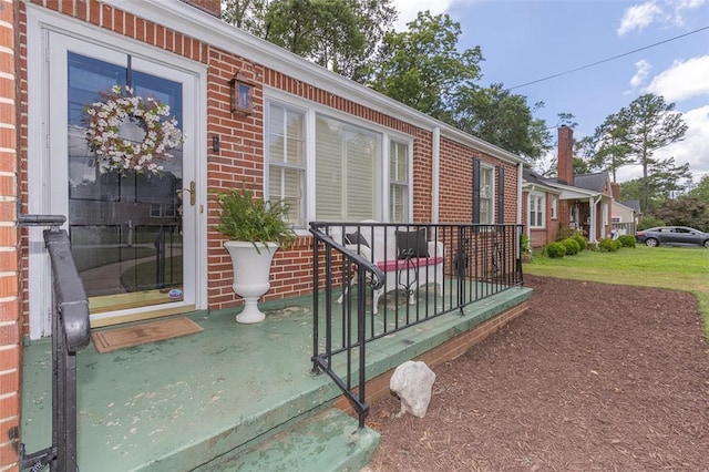 205 James St, Anderson, SC 29625 - property entrance with brick siding and covered porch