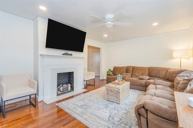 205 James St, Anderson, SC 29625 - living area with a ceiling fan, recessed lighting, wood finished floors, and a fireplace with flush hearth