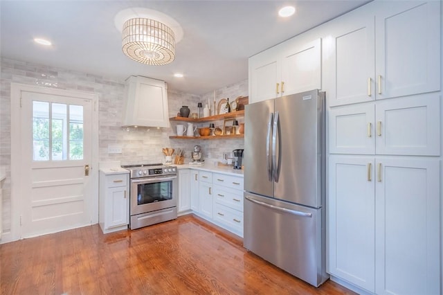 205 James St, Anderson, SC 29625 - kitchen with stainless steel appliances, open shelves, premium range hood, light countertops, and white cabinetry