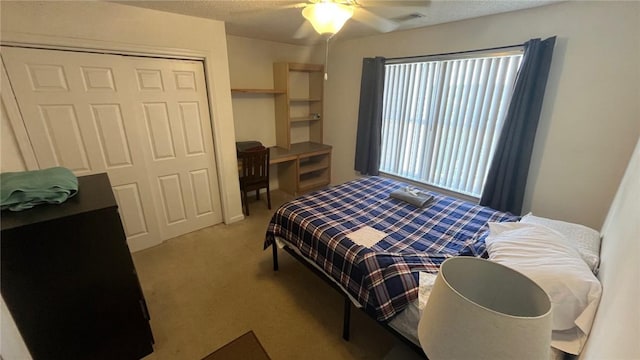 1132 Harts Ridge Dr, Seneca, SC 29678 - carpeted bedroom with a closet, ceiling fan, and a textured ceiling