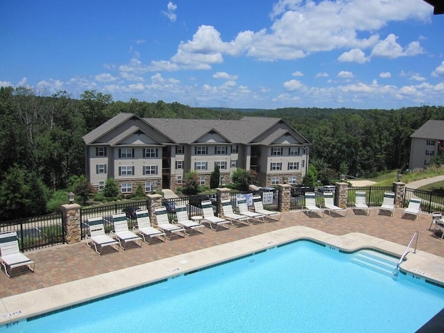 1132 Harts Ridge Dr, Seneca, SC 29678 - community pool with a patio and a view of trees