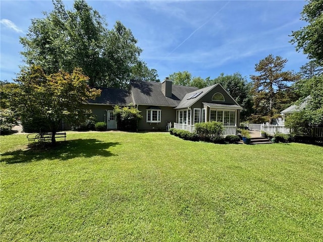 203 Ashley Rd, Clemson, SC 29631 - back of property with a lawn and a chimney