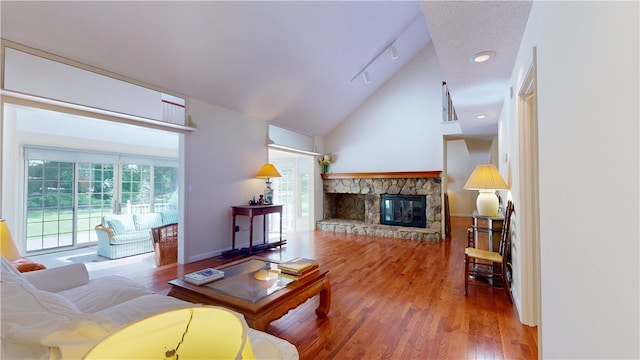 203 Ashley Rd, Clemson, SC 29631 - living area featuring wood finished floors, a fireplace, and high vaulted ceiling