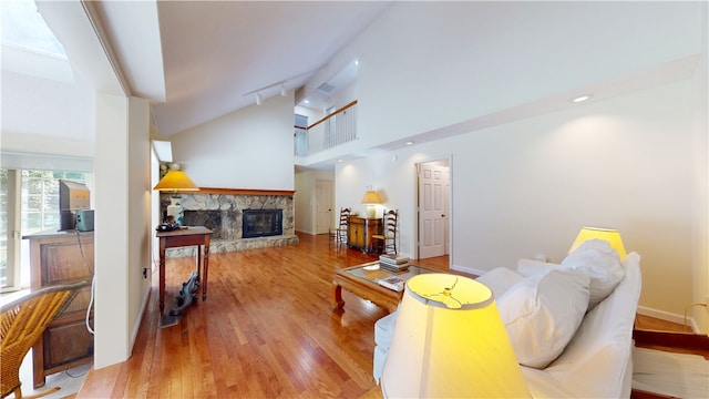 203 Ashley Rd, Clemson, SC 29631 - living area with wood finished floors, a fireplace, and high vaulted ceiling