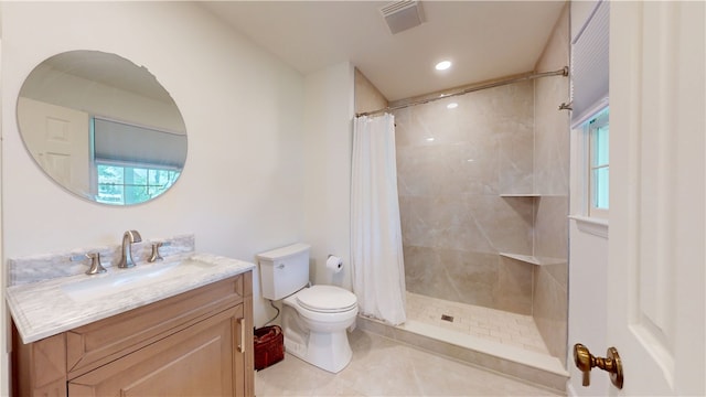 203 Ashley Rd, Clemson, SC 29631 - bathroom with vanity, a tile shower, tile patterned floors, healthy amount of natural light, and recessed lighting