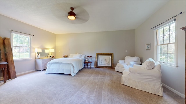203 Ashley Rd, Clemson, SC 29631 - bedroom with multiple windows, light colored carpet, and ceiling fan