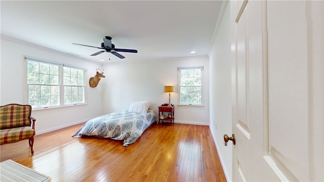 203 Ashley Rd, Clemson, SC 29631 - bedroom featuring multiple windows, ornamental molding, hardwood / wood-style flooring, and ceiling fan