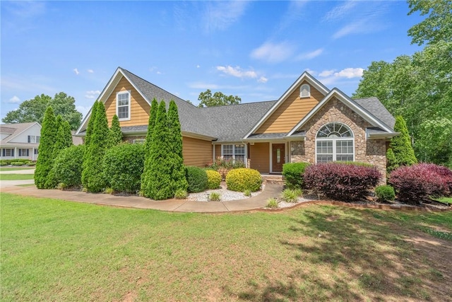1339 Griffin Mill Rd, Easley, SC 29640 - view of front of property featuring a front lawn, stone siding, and a shingled roof