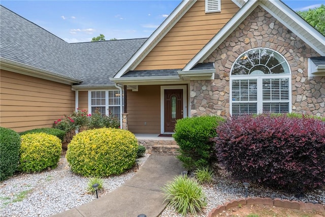 1339 Griffin Mill Rd, Easley, SC 29640 - view of exterior entry with stone siding and a shingled roof