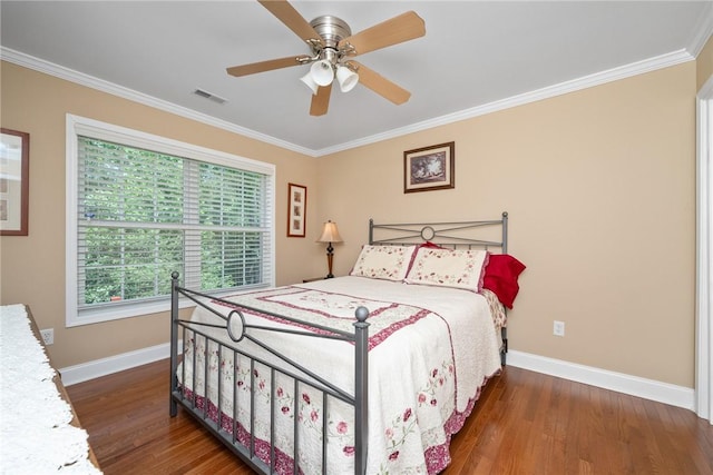 1339 Griffin Mill Rd, Easley, SC 29640 - bedroom with crown molding, wood finished floors, and ceiling fan