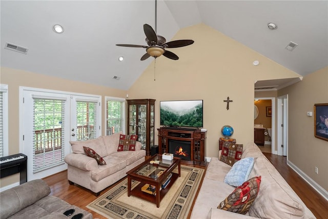 1339 Griffin Mill Rd, Easley, SC 29640 - living area with wood finished floors, a ceiling fan, a lit fireplace, high vaulted ceiling, and recessed lighting