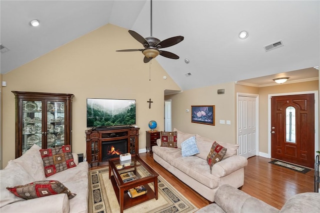 1339 Griffin Mill Rd, Easley, SC 29640 - living area with a ceiling fan, wood finished floors, high vaulted ceiling, a warm lit fireplace, and recessed lighting
