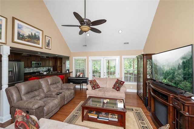 1339 Griffin Mill Rd, Easley, SC 29640 - living area featuring high vaulted ceiling, wood finished floors, and ceiling fan