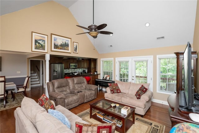 1339 Griffin Mill Rd, Easley, SC 29640 - living area with high vaulted ceiling, a ceiling fan, stairs, and wood finished floors