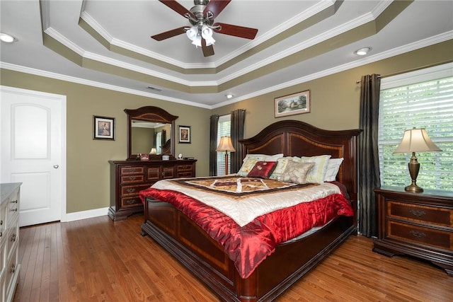 1339 Griffin Mill Rd, Easley, SC 29640 - bedroom with a tray ceiling, hardwood / wood-style floors, and ornamental molding