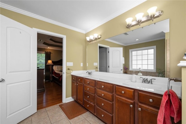 1339 Griffin Mill Rd, Easley, SC 29640 - full bathroom with tile patterned floors, double vanity, ornamental molding, healthy amount of natural light, and ensuite bathroom