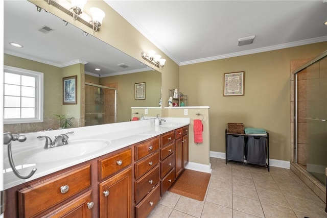 1339 Griffin Mill Rd, Easley, SC 29640 - bathroom featuring double vanity, a stall shower, tile patterned flooring, and crown molding
