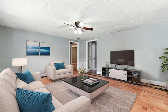 159 Rabbit Rd, Pickens, SC 29671 - living area featuring a ceiling fan, wood finished floors, and a textured ceiling