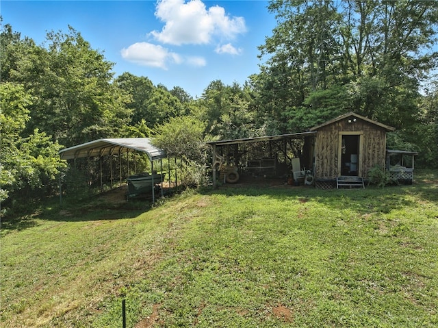 159 Rabbit Rd, Pickens, SC 29671 - view of grassy yard with a carport and a storage unit